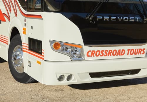 Passenger motorcoach charter bus side view